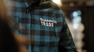 Close up of a man wearing a Bunnings Trade flannel shirt